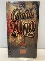 Shrink-wrapped presentation sleeve marked Canada 2002