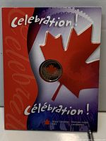 Front of presentation card showing coin and red maple leaf graphic