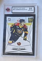 Front view of graded 2015 In The Game Connor McDavid #01 trading card in KSA slab