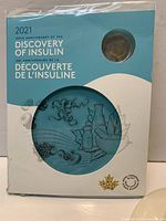 Front of sealed 2021 Insulin coin set packaging