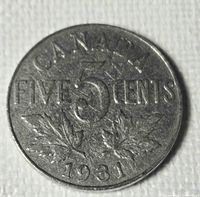 Reverse side of 1931 Canada 5-cent coin showing denomination and date