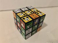Angled view of the Disney 3x3 puzzle cube showing multiple character stickers