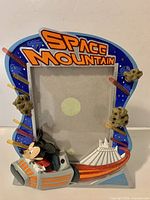 Front view of Space Mountain Mickey Mouse resin photo frame showing design and picture opening