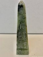 Full view of obelisk front face showing engravings