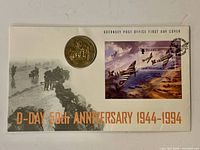 Front of first day cover showing illustration, £2 coin, 25p stamp and cancellation