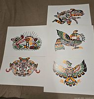 All five John Nelson prints laid out, showing artwork and white borders