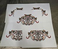 Five identical unsigned Longhouse Mask prints laid out to show design and condition
