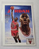 Front view of Michael Jordan The Collector's Choice trading card in protective sleeve