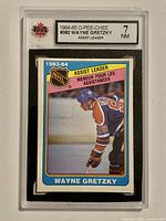 Front view of graded Wayne Gretzky 1984-85 O-Pee-Chee #382 card in KSA slab