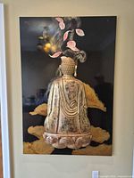 Front view of Buddha relief on black panel