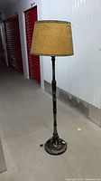 Full standing view of lamp showing overall condition and height