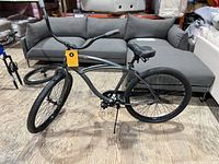 Full view of Capitol cruiser bicycle, gray frame, kickstand down