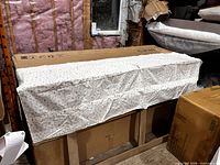 Valance folded on table showing overall fabric and size