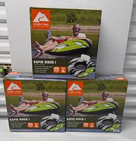 Three sealed boxes of Ozark Trail Rapid Rider I inflatable river tubes