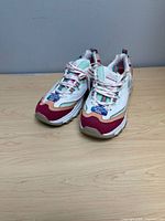 Pair of Skechers women’s sneakers angled view