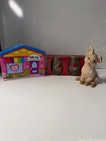 Tin, boxed glasses, pig figurine overview