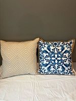 Both outdoor pillows side by side
