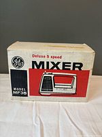 Front of box displaying GE branding and model number