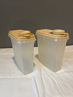 Two containers side by side showing overall condition