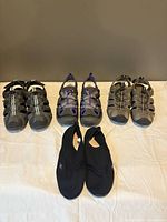 All four pairs arranged on cloth backdrop