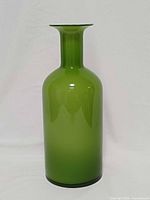 Full upright view of green glass vase front