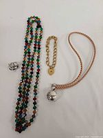 All jewellery items laid out on white background