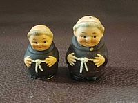 Front view of both Friar Tuck shakers