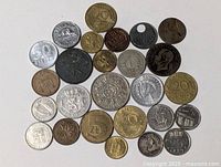 Overview of entire group of world coins laid out