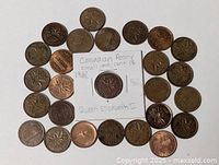 All coins arranged in ring with 1960 Canadian cent in holder at center