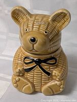 Front view of ceramic bear honey pot with lid attached