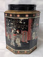 front view showing figures and floral design