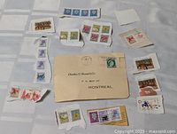 Full layout of stamps and envelope on surface