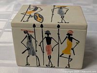 Top view showing painted figures on lid of soapstone box