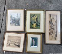 overview of all five framed artworks laid on ground