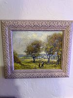 Front view of framed oil painting
