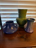 Group shot of three ceramic vases