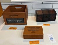 All three storage pieces side by side with size tags