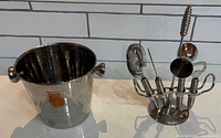 overview of ice bucket and bar tool set on counter