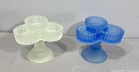 Pair of satin glass triple votive holders, custard and blue, showing overall form