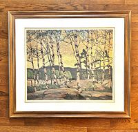 Frontal view of framed lithograph showing full artwork, frame and mat