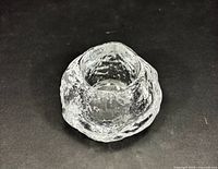 Top view showing recessed candle well and textured glass surface