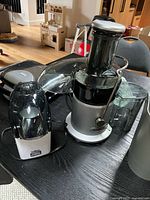 Juicer, popcorn maker and grill on tabletop