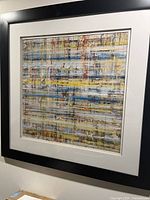 Full view of framed abstract painting