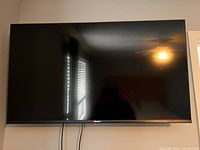 Front view of Hisense TV powered off