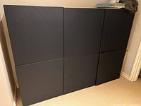 Front view showing six navy doors