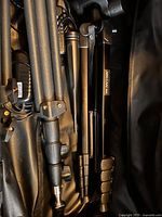 Interior of bag showing folded light stands and hardware