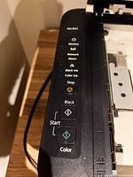 Control panel showing buttons and indicators on Canon printer