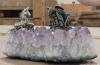 Front view showing amethyst cluster with attached pewter wizard and unicorn