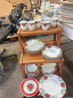 Overall view of cups, plates and bowls on wooden stand