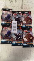 Six sealed Bakugan Battle Brawlers booster packs front view